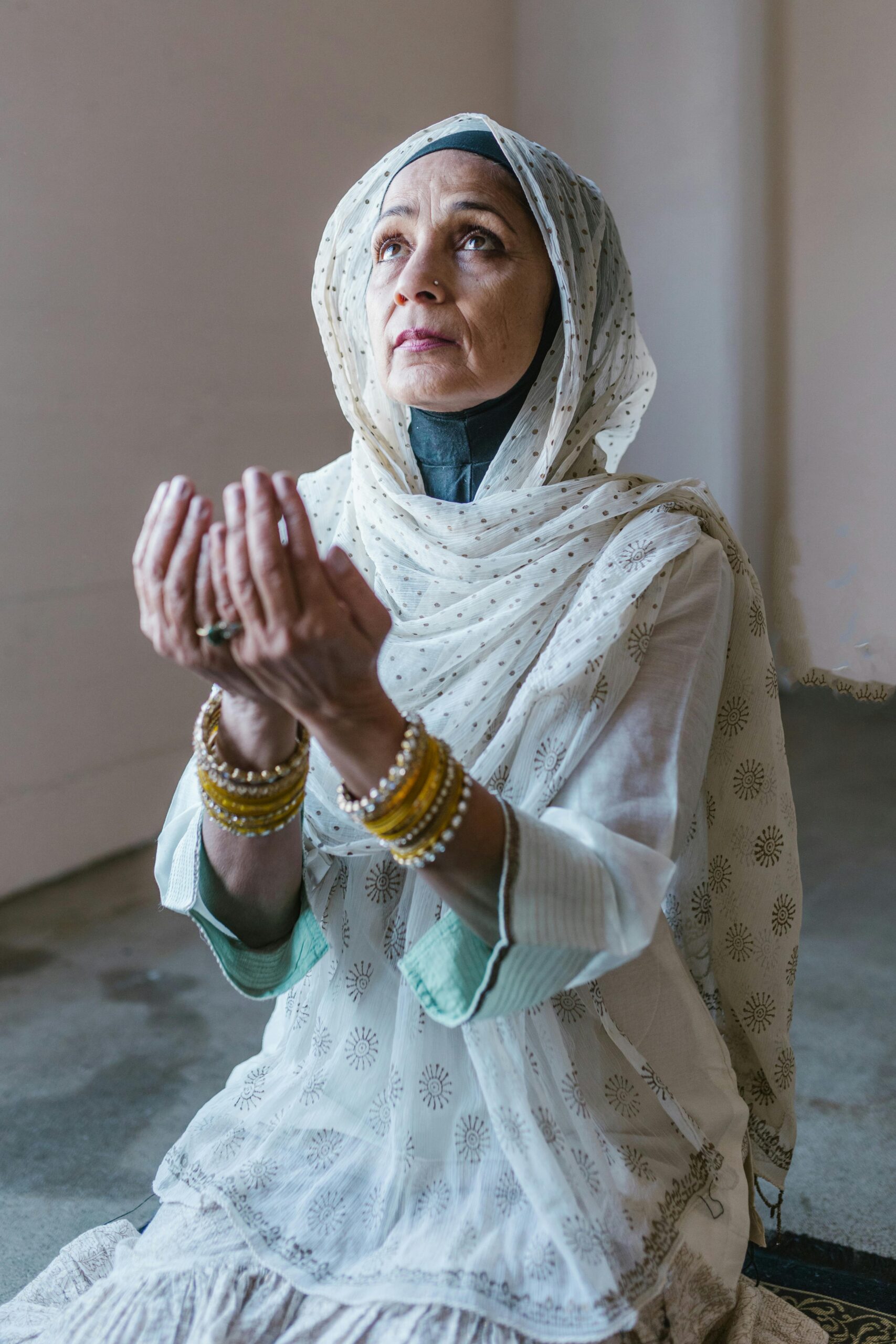 Muslim women supplicating God for salvation.
