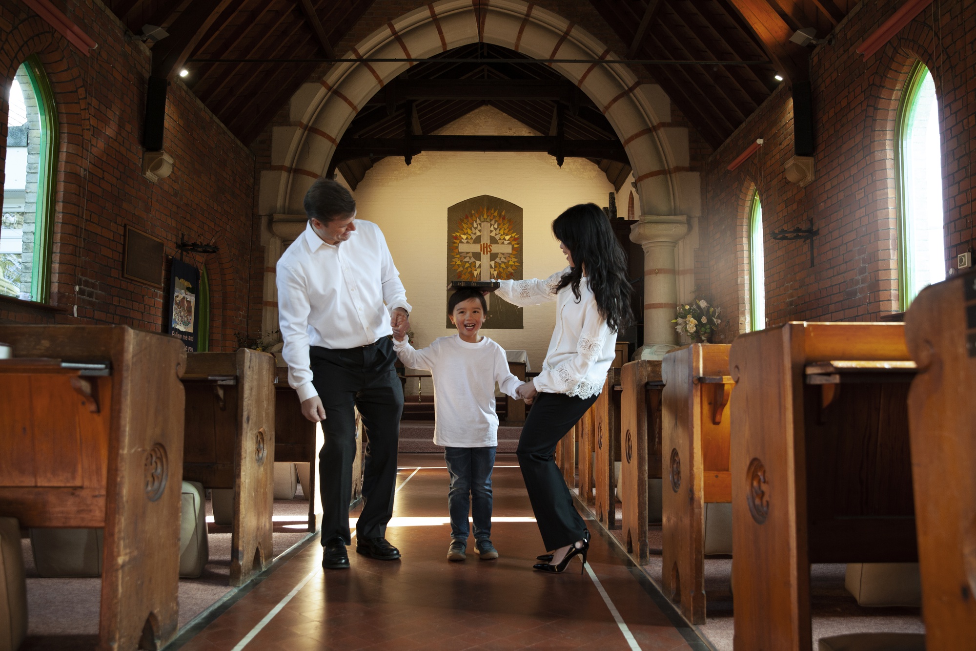 Happy family in a church.