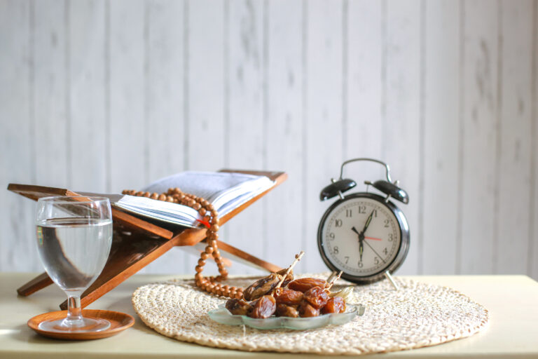 breakfast meal with a clock and Quran